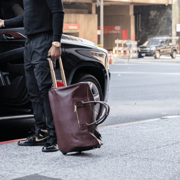 Signature Traveler Rolling Duffle in Mint
