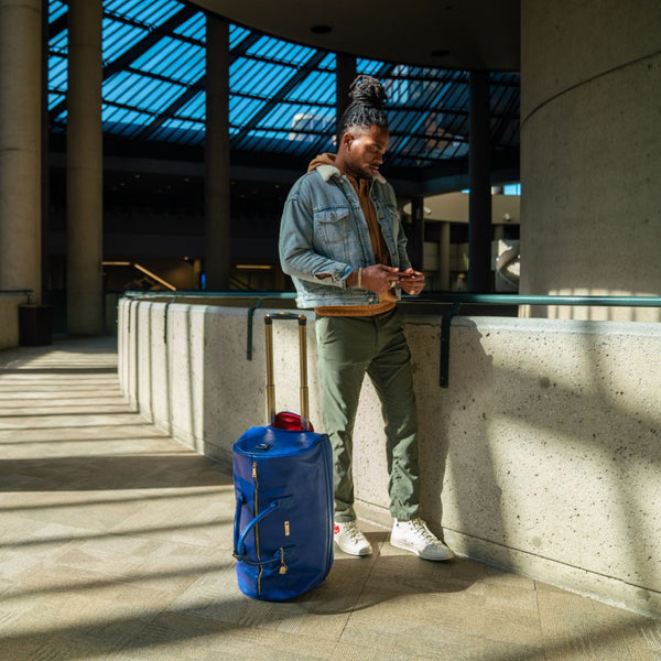 Signature Traveler Rolling Duffle in Royal Blue