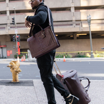 Signature Traveler Rolling Duffle in Chocolate
