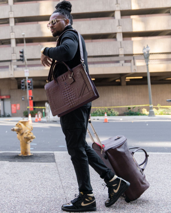 Signature Traveler Rolling Duffle in Chocolate