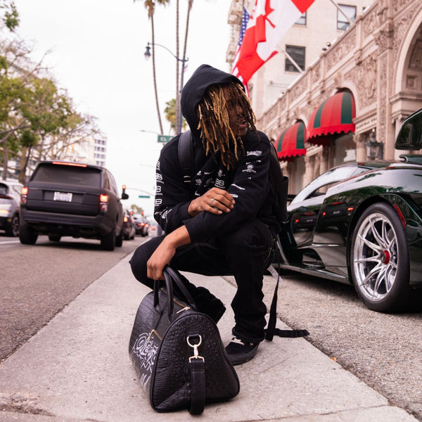 Statement Weekender Duffle Bag in Black