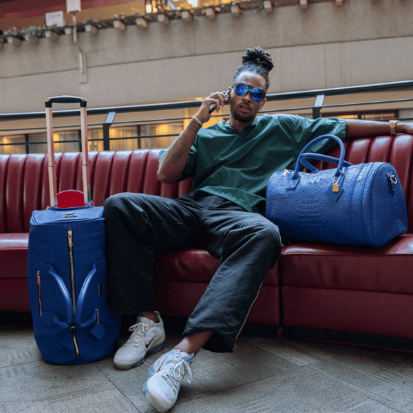Statement Traveler Rolling Duffles
