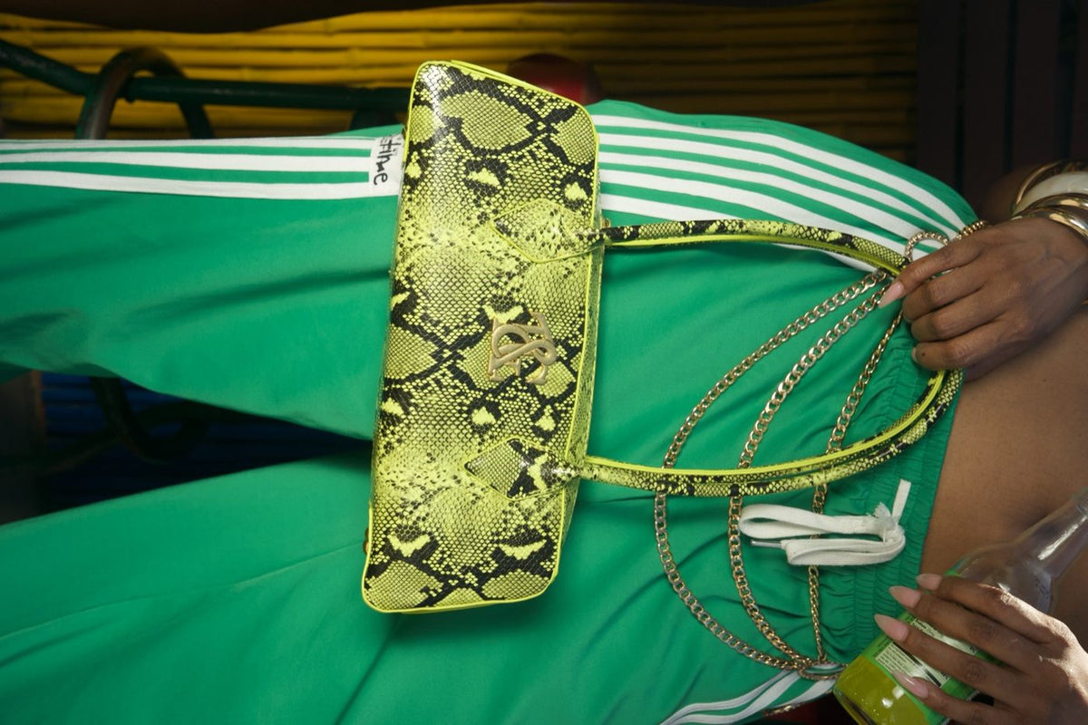Sienna Shoulder Bag in Viper against green track pants