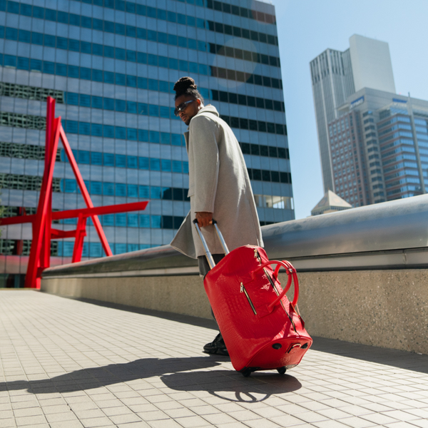 Statement Traveler Rolling Duffles