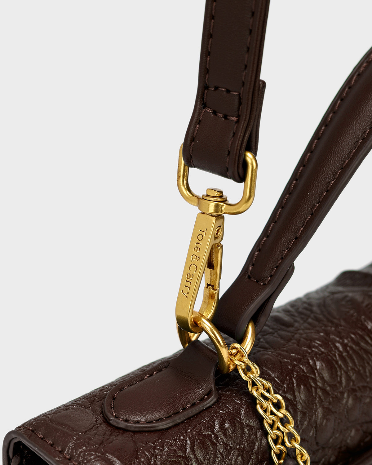 Luxury Heritage Handheld Clutch In Brown