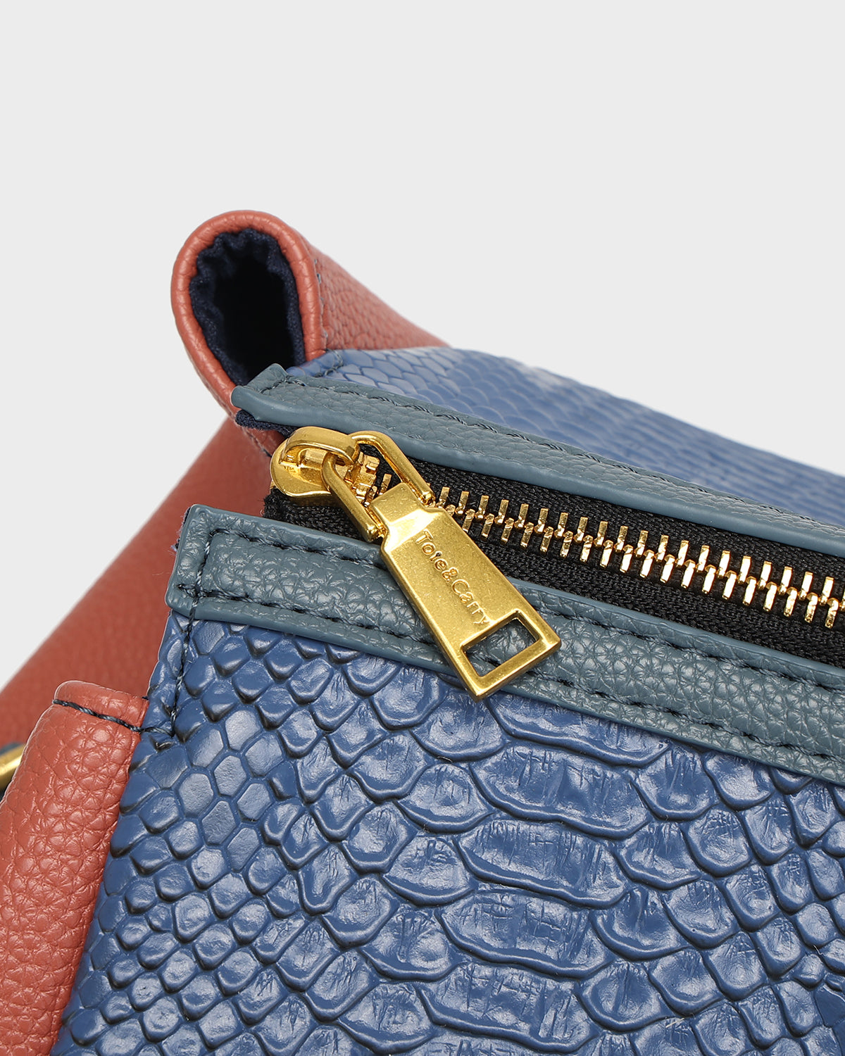Power Luxe Duffle Bag in Blue & Clay-Red