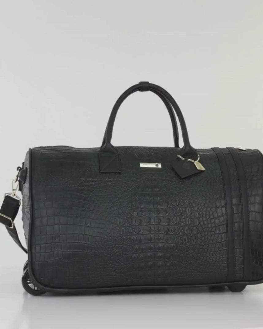 Statement Traveler Rolling Duffle in Black