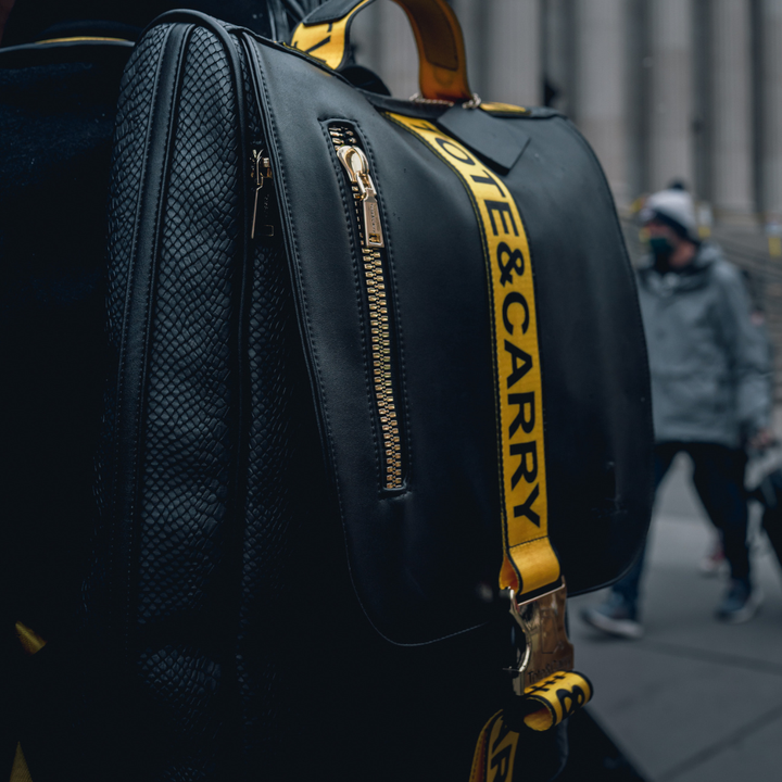 Caution Tape Backpack in Black & Yellow