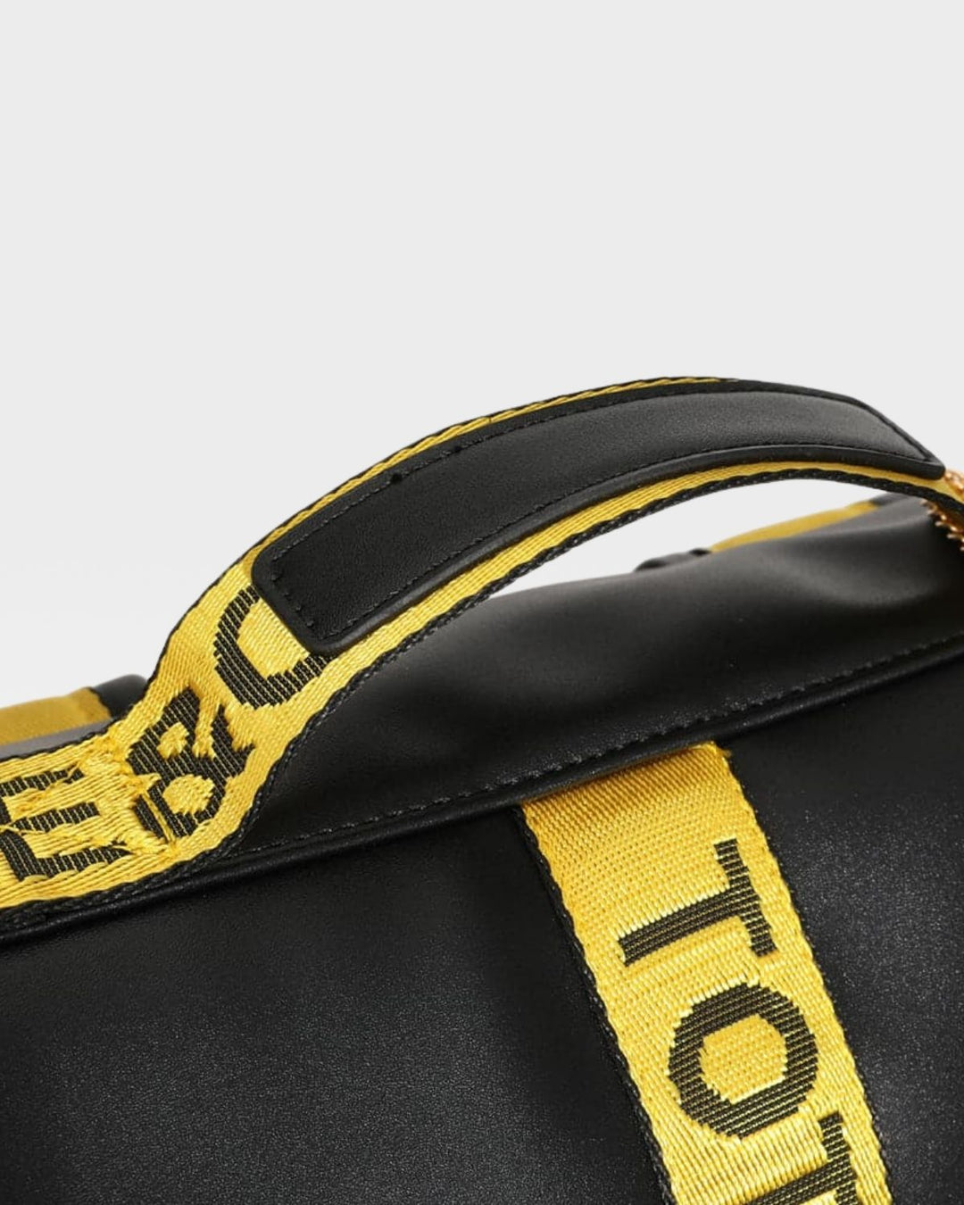 Caution Tape Backpack in Black & Yellow