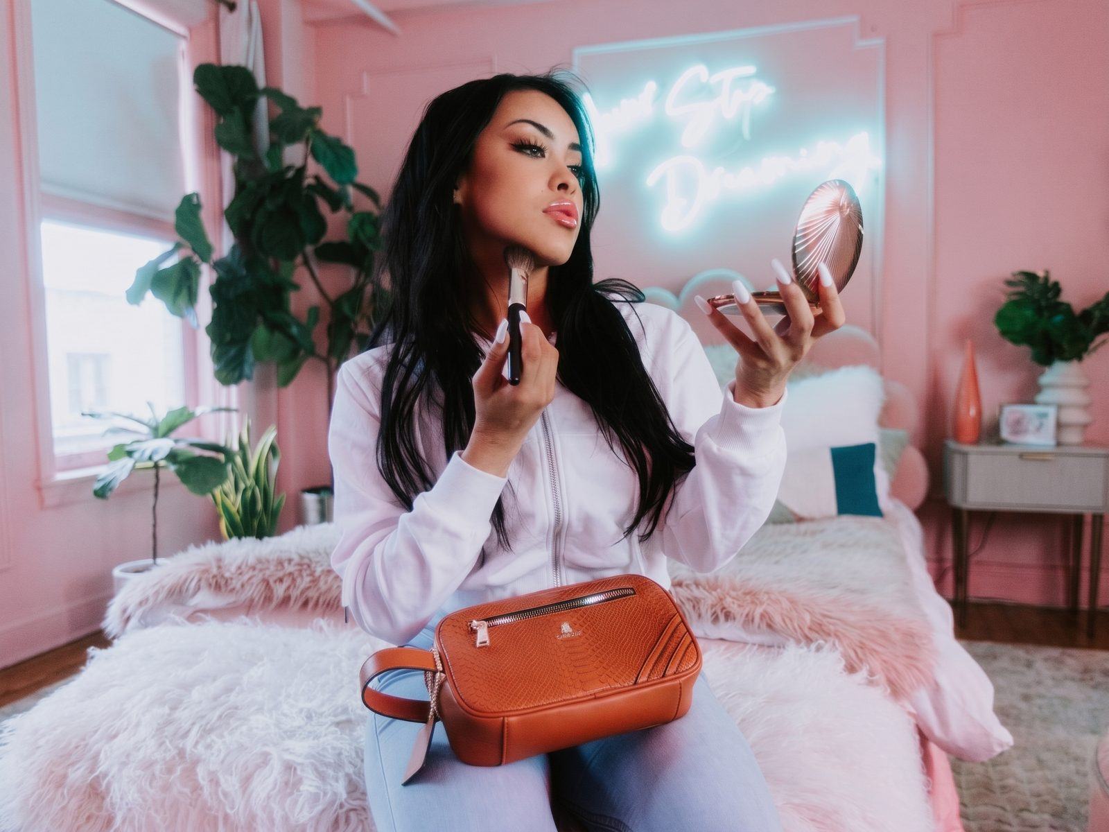 Model with a caramel Apollo belt bag